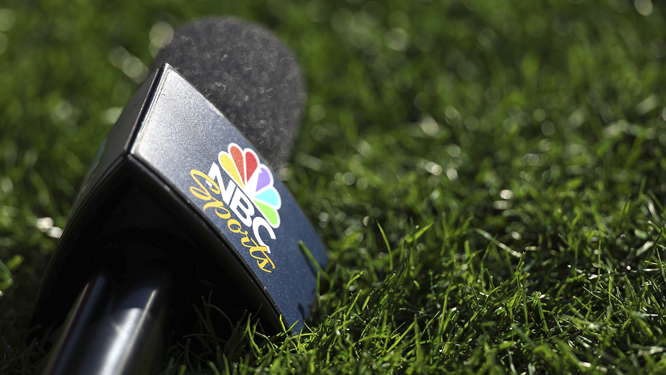 NBC Sports microphone laying on grass